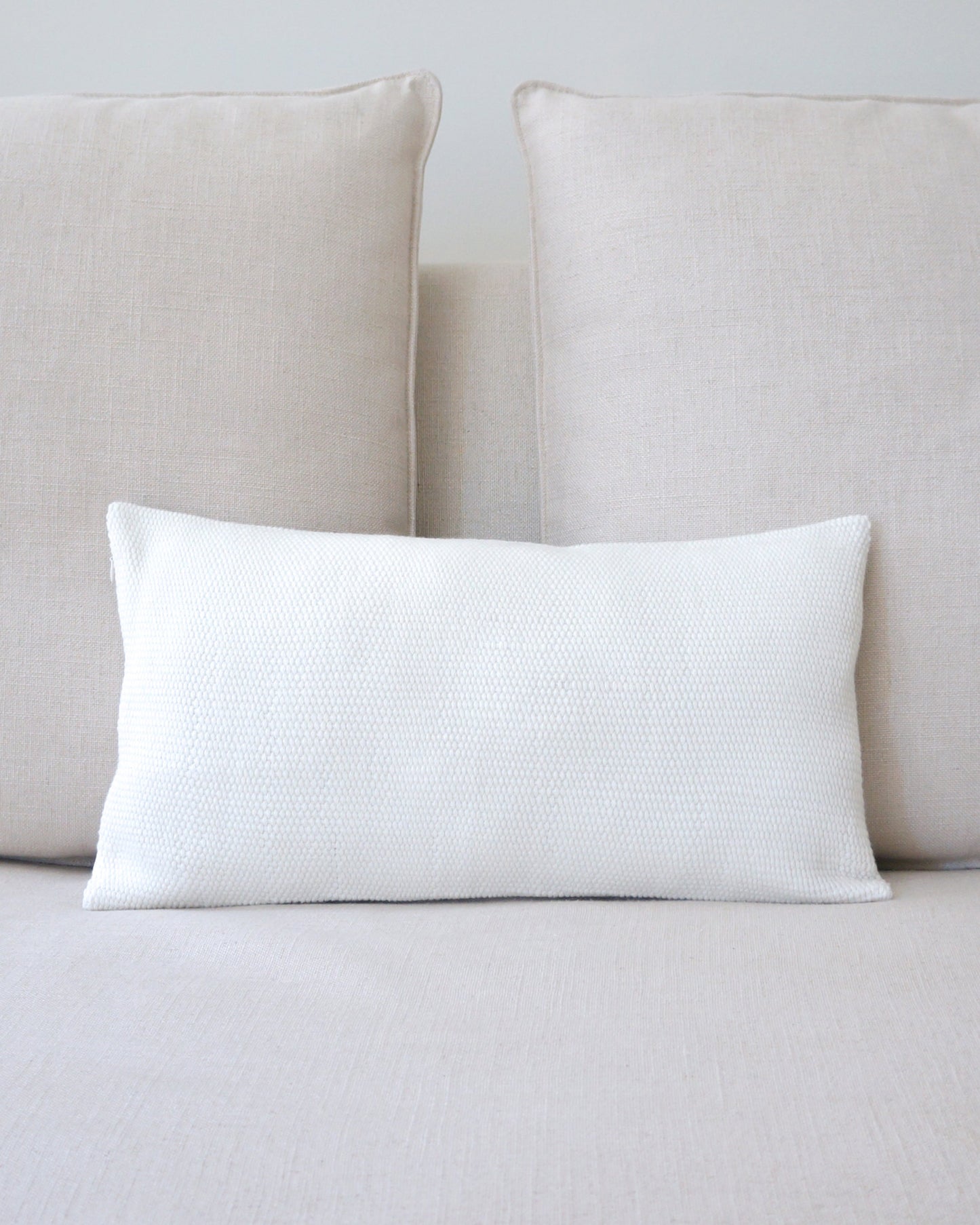 Solid Lumbar Pillow in Ivory Cotton