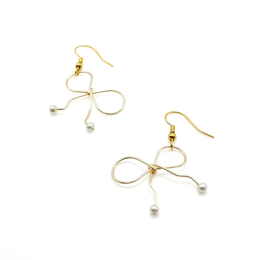 Pearl gold bow earrings