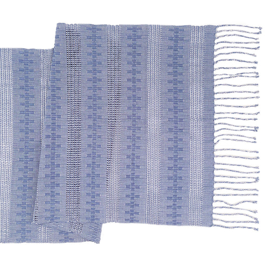 Overhead view of the Calado Table Runner in Blue with twisted fringe