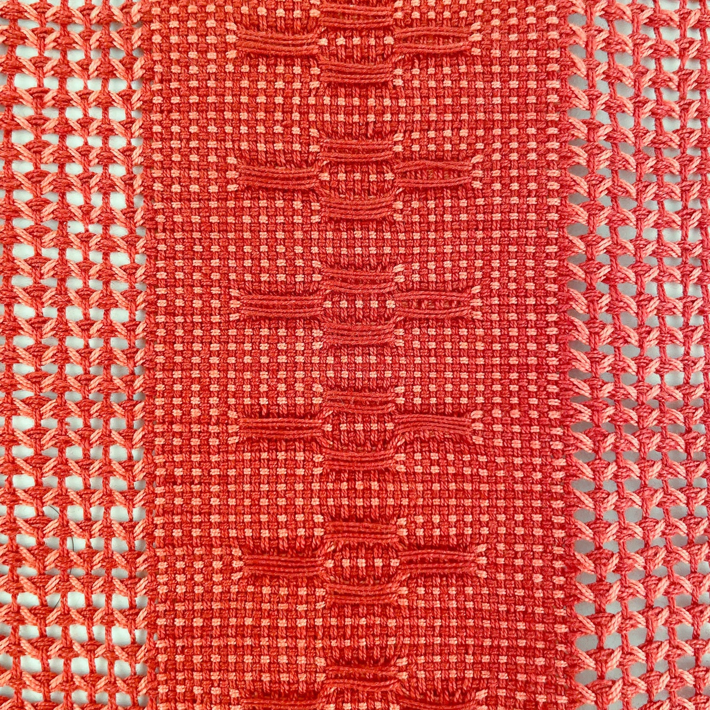 Closeup of view of Calado Table Runner in Terracotta, showing detail of calado pattern